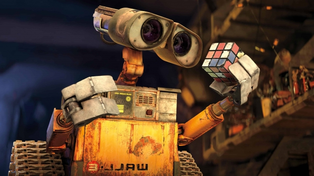 O cubo mágico aparece em filmes como Wall-e, que está segurando o cubo mágico na foto